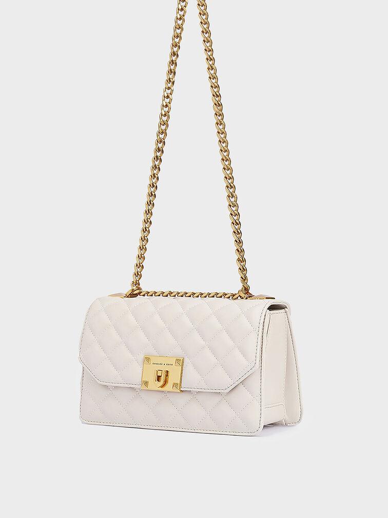 Túi Charles Keith Đeo Chéo Nắp Gập Quilted Kem