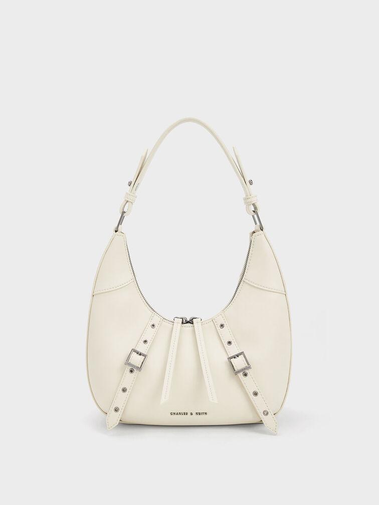 Túi Charles Keith Hobo Dáng Cong Grommet Crescent Phấn