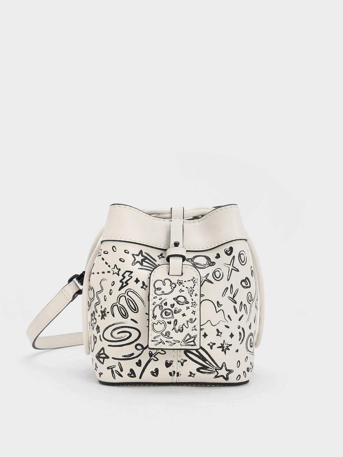 Túi Charles Keith Rút Dây Cordele Printed Kem