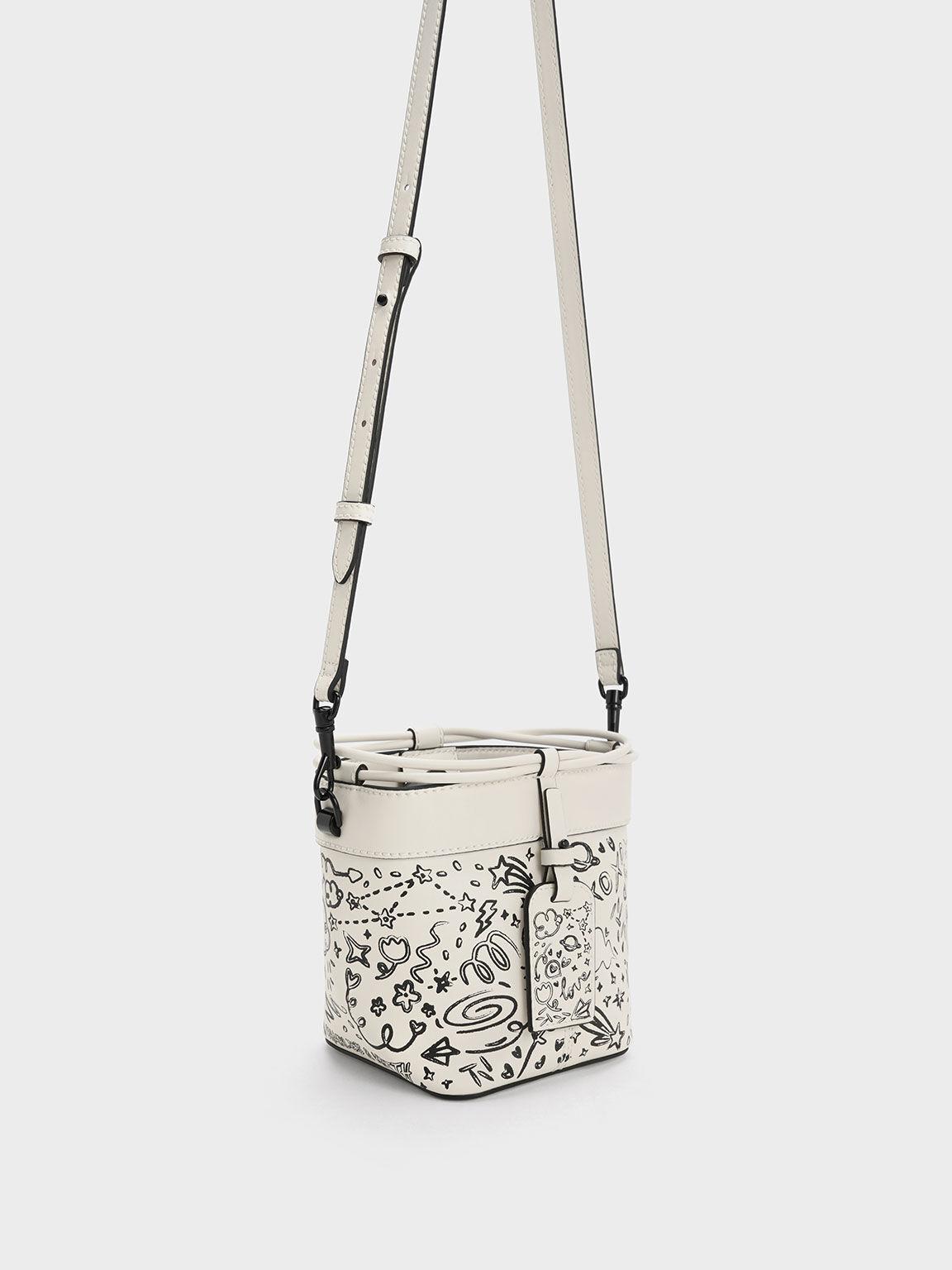 Túi Charles Keith Rút Dây Cordele Printed Kem