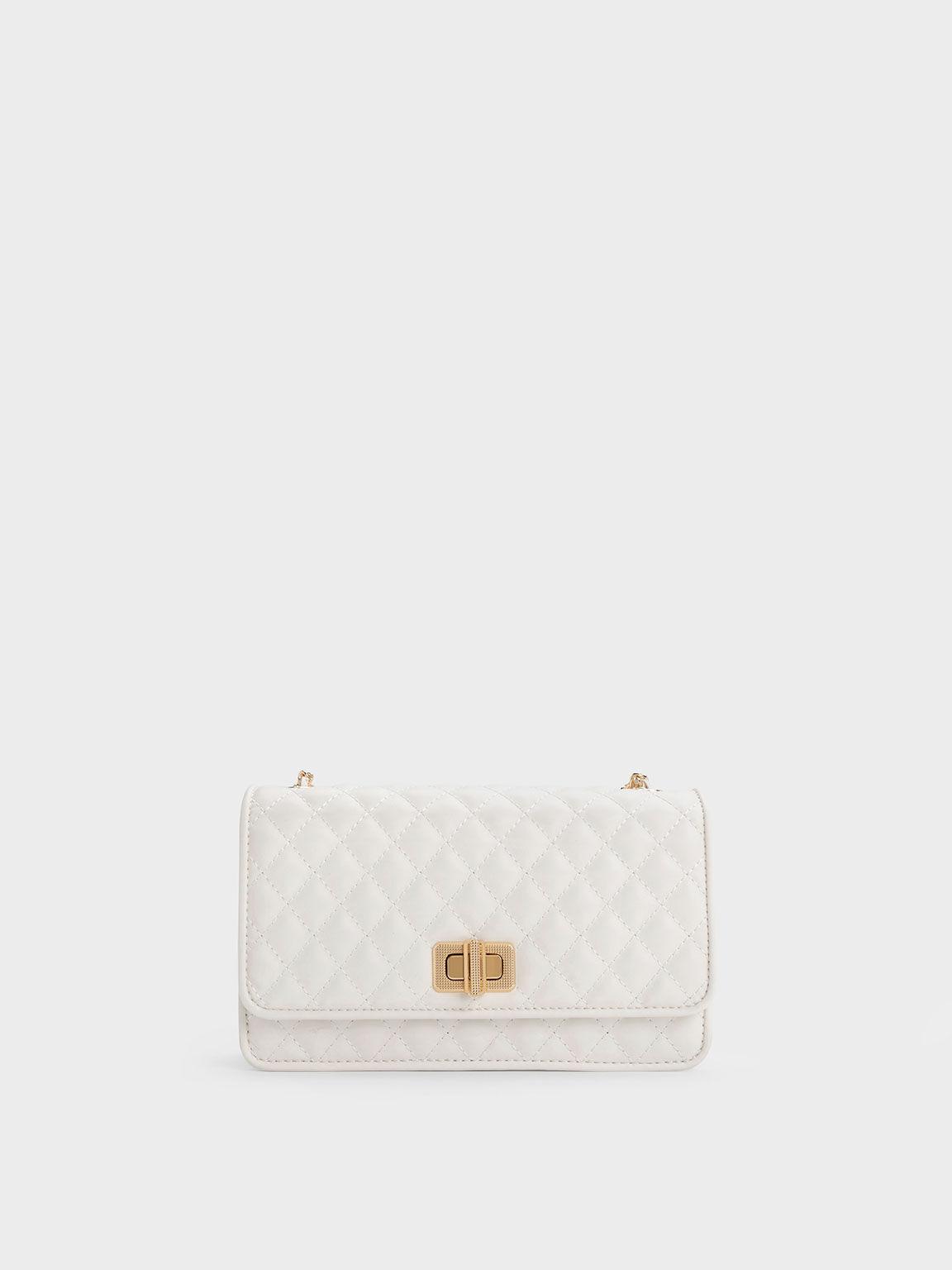 Túi Charles Keith Clutch Chần Bông Metallic Turn-Lock Quilted Trắng