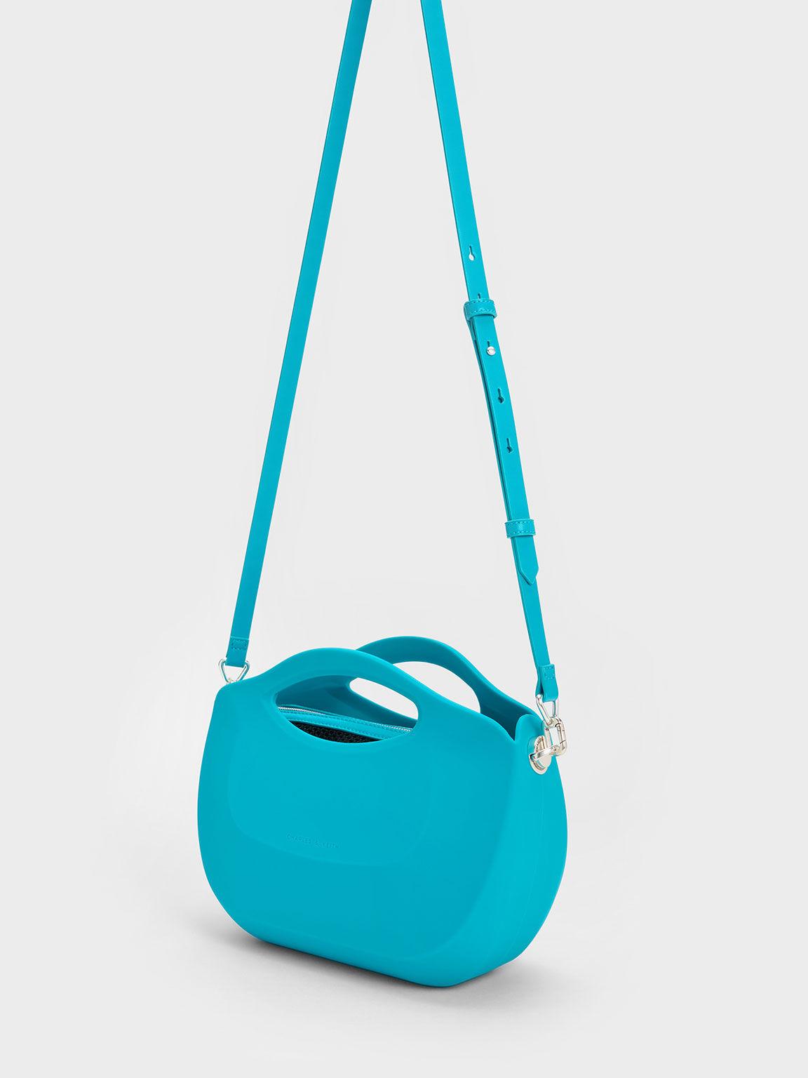 Túi Charles Keith Xách Hình Thang Cocoon Curved Xanh Blue