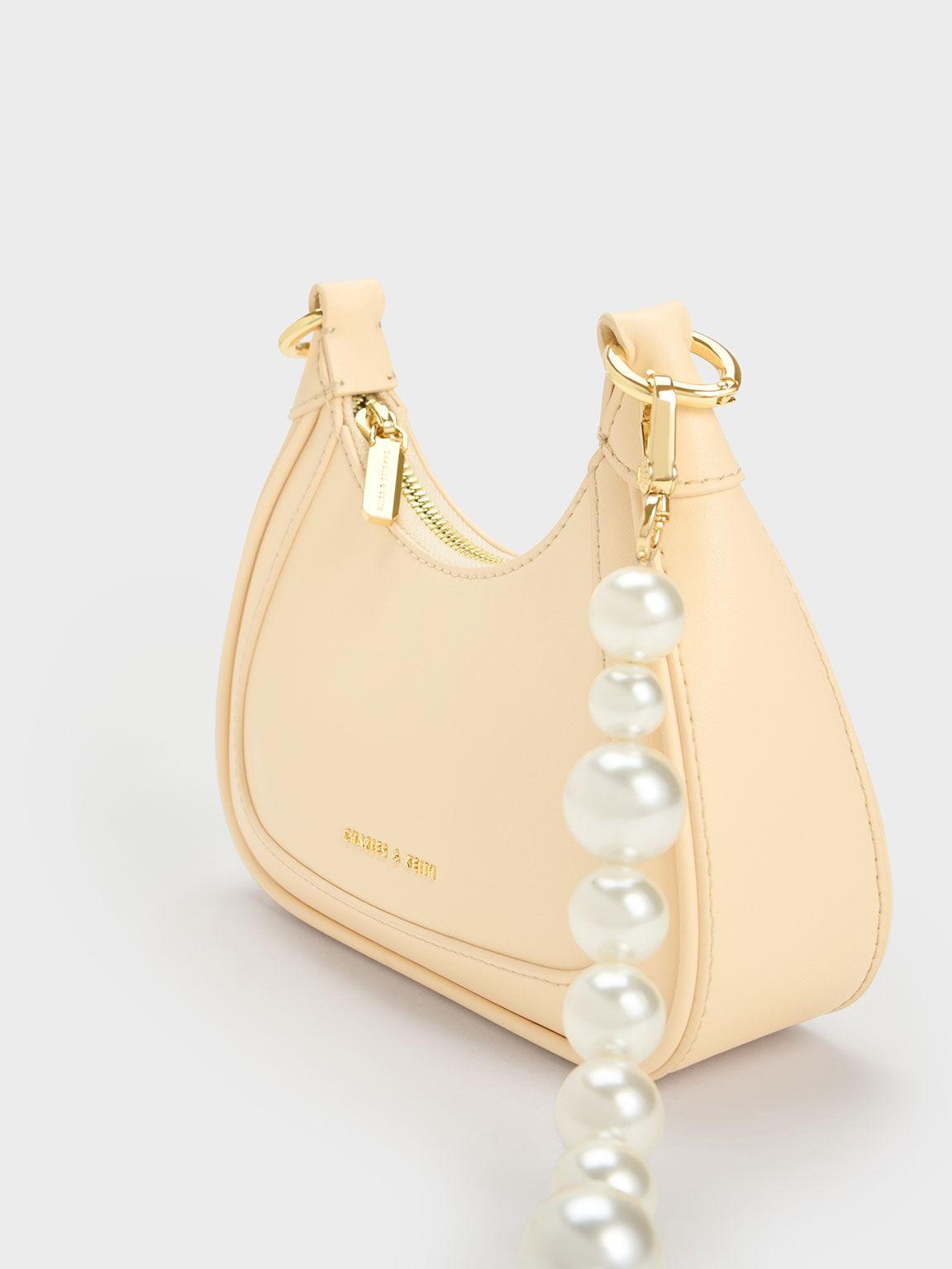 Túi Charles Keith Xách Hobo Hình Thang Beaded Be