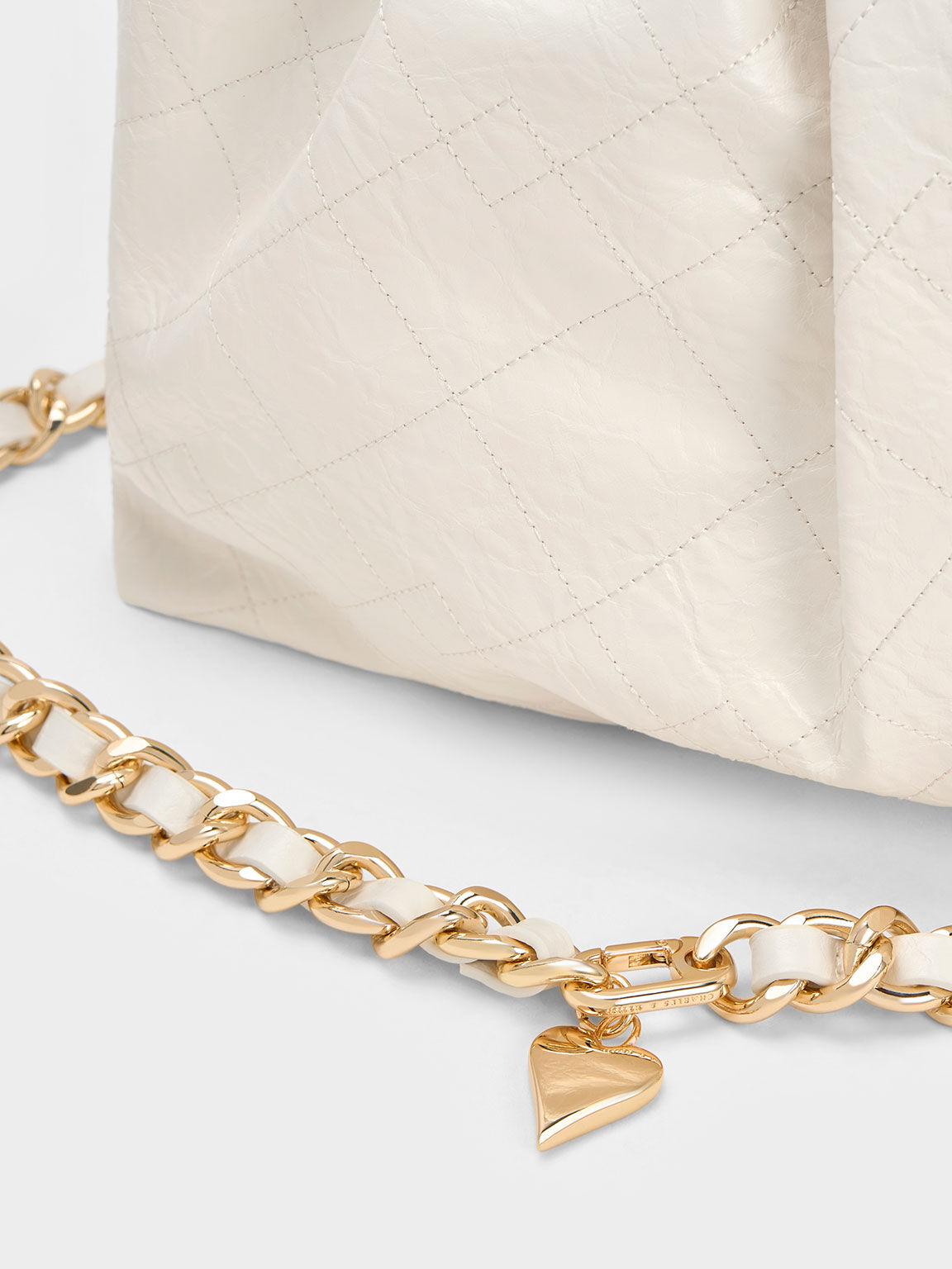 Túi Charles Keith Hobo Duo Double Chain Kem