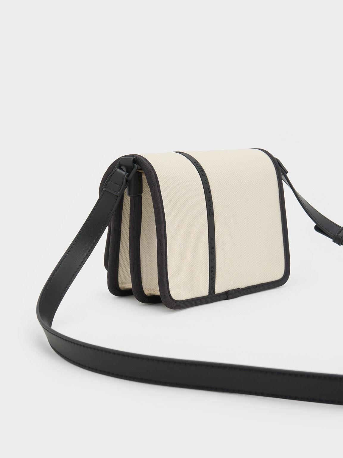 Túi Charles Keith Đeo Chéo Chữ Nhật Avenue Contrast-Trim Kem