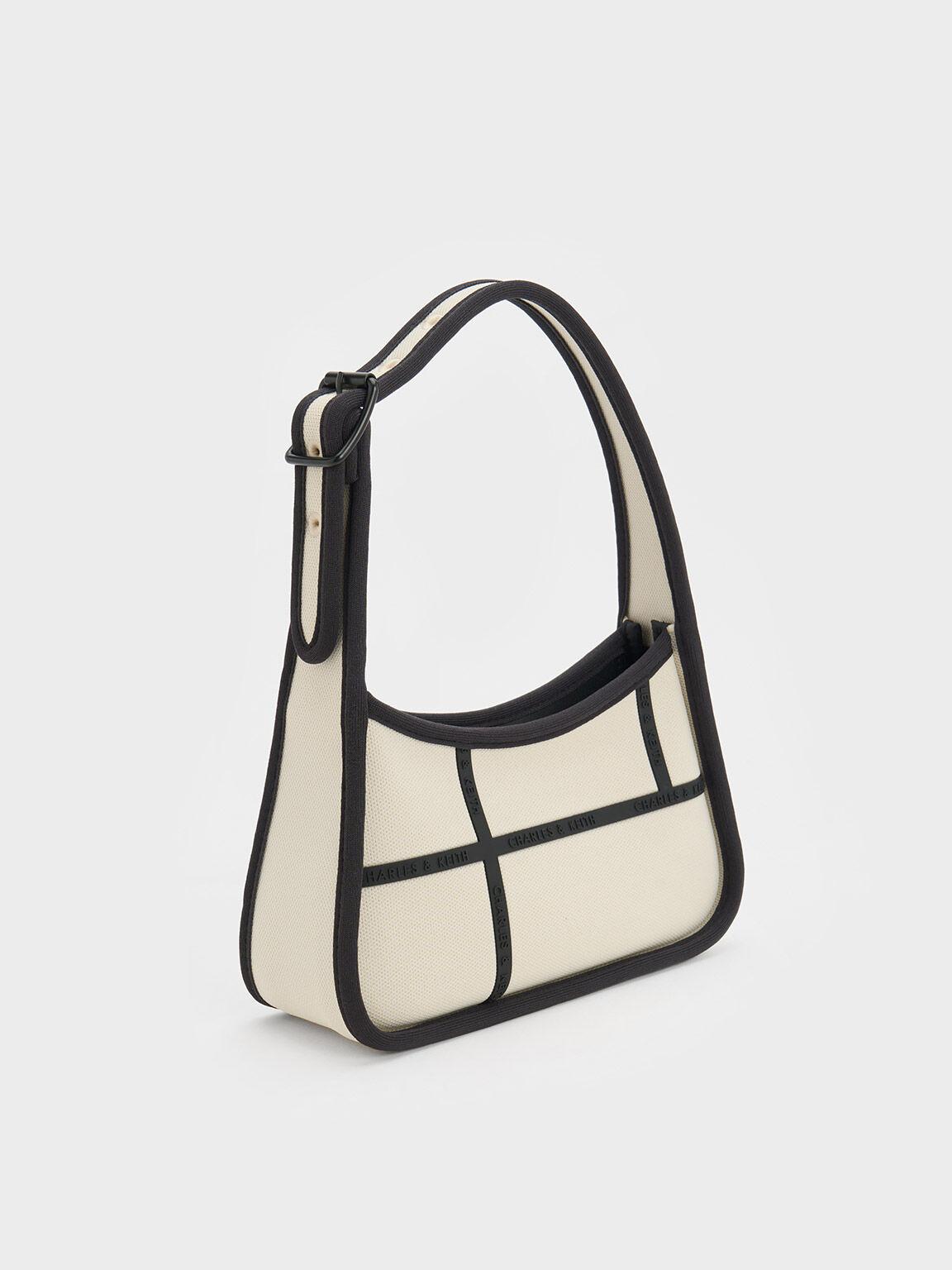 Túi Charles Keith Đeo Vai Hình Thang Avenue Contrast-Trim Trapeze Kem