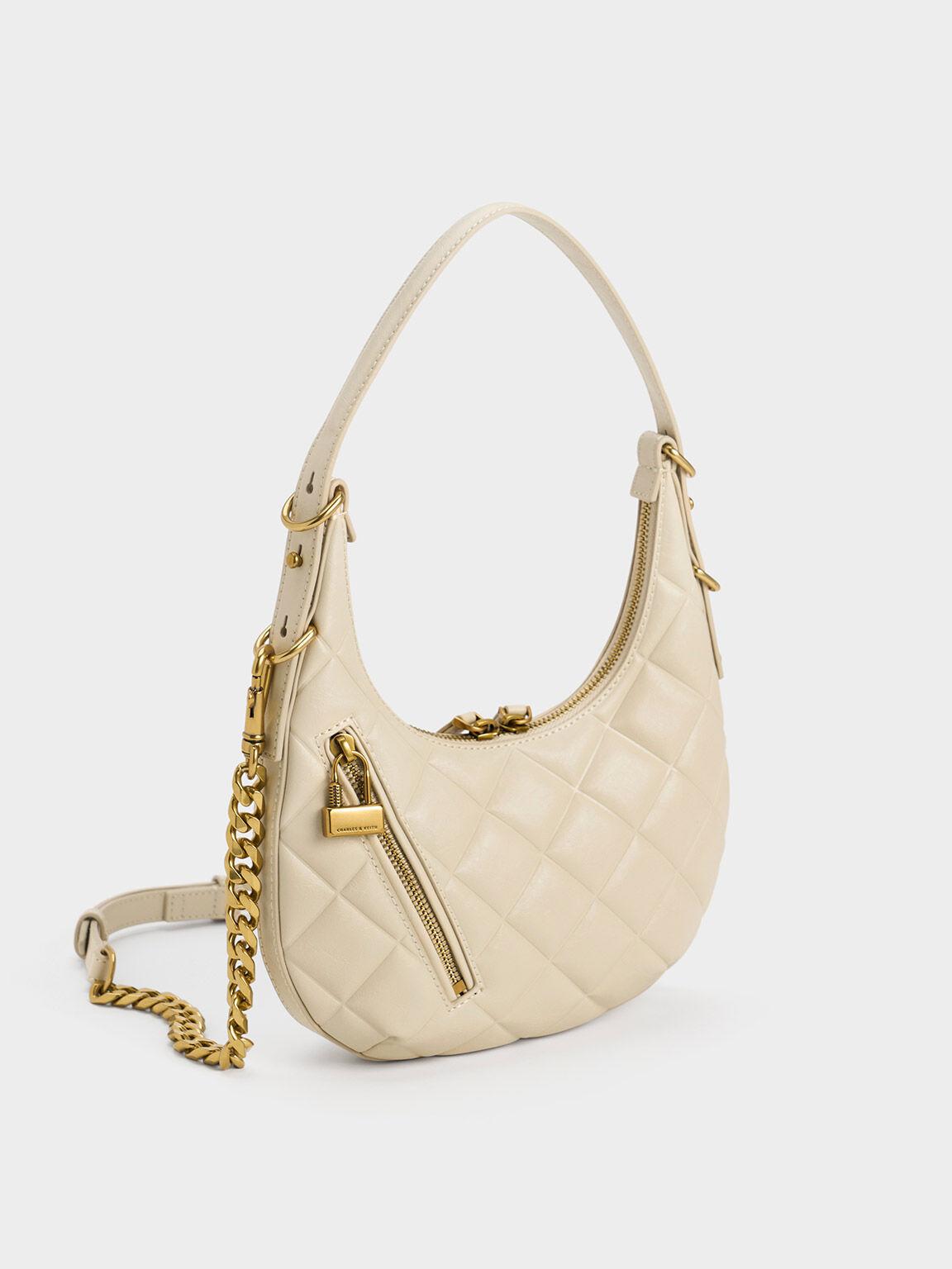 Túi Charles & Keith Swing Padlock Quilted Crescent Bag Nữ Be