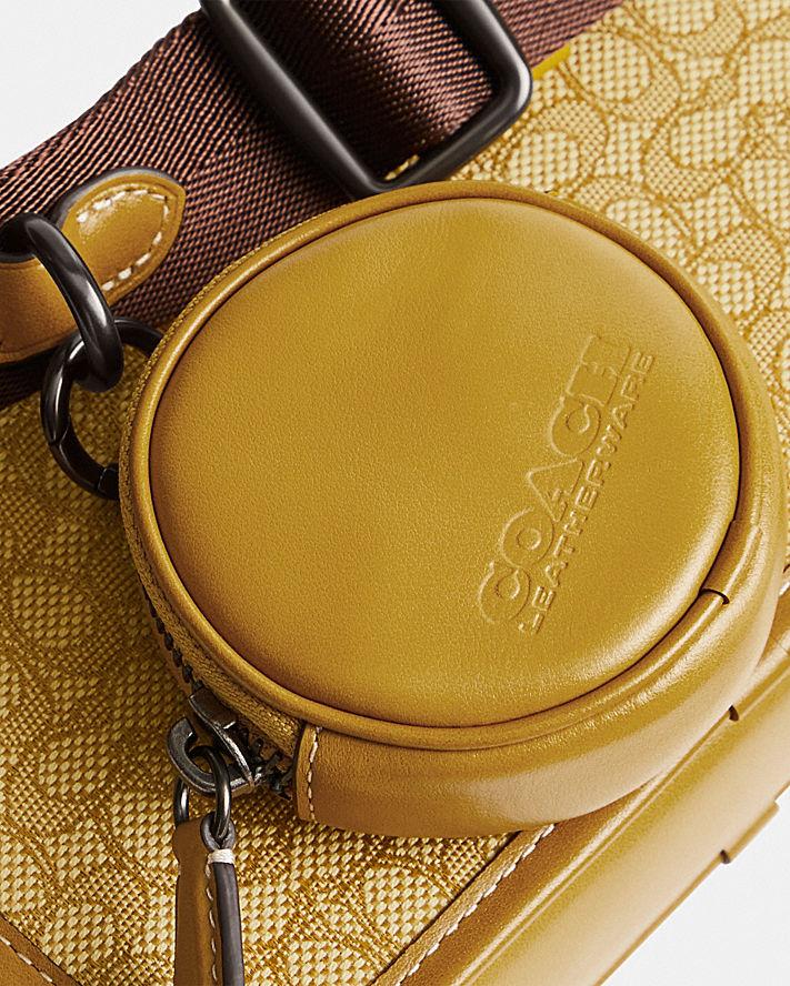 Túi Coach Charter Slim Crossbody In Micro Signature Jacquard Nam Vàng