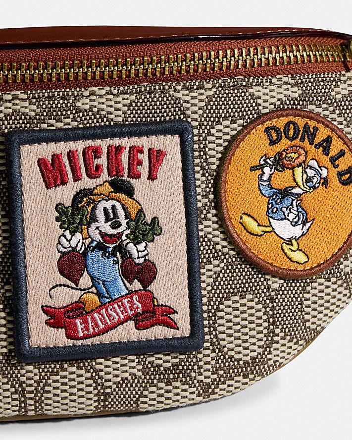 Túi Coach Disney X Coach Charter Belt Bag 7 Signature Textile Jacquard With Patches Nam Nâu